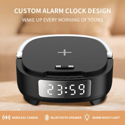 Reloj de alarma multifuncional cargador de teléfono altavoz Bluetooth 15W con luz nocturna